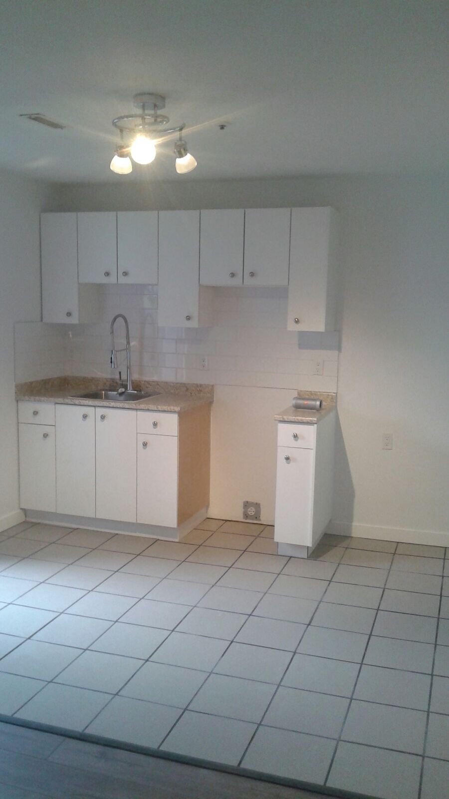 Modern LED kitchen lighting installation in Vancouver.