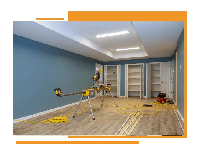 Professional interior painting contractor in Vancouver painting a modern living room.